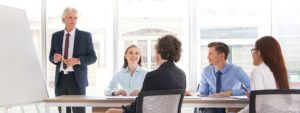 5 people attending an office meeting | Thornley Group